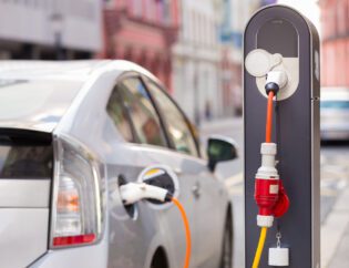 Electric Car in Charging Station.